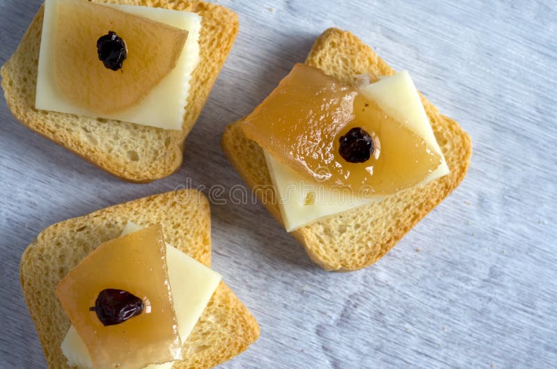 Delicious Mini Crackers with Apple, Cheese and Raisins Stock Photo