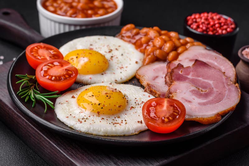 Delicious Nutritious English Breakfast with Fried Eggs and Tomatoes