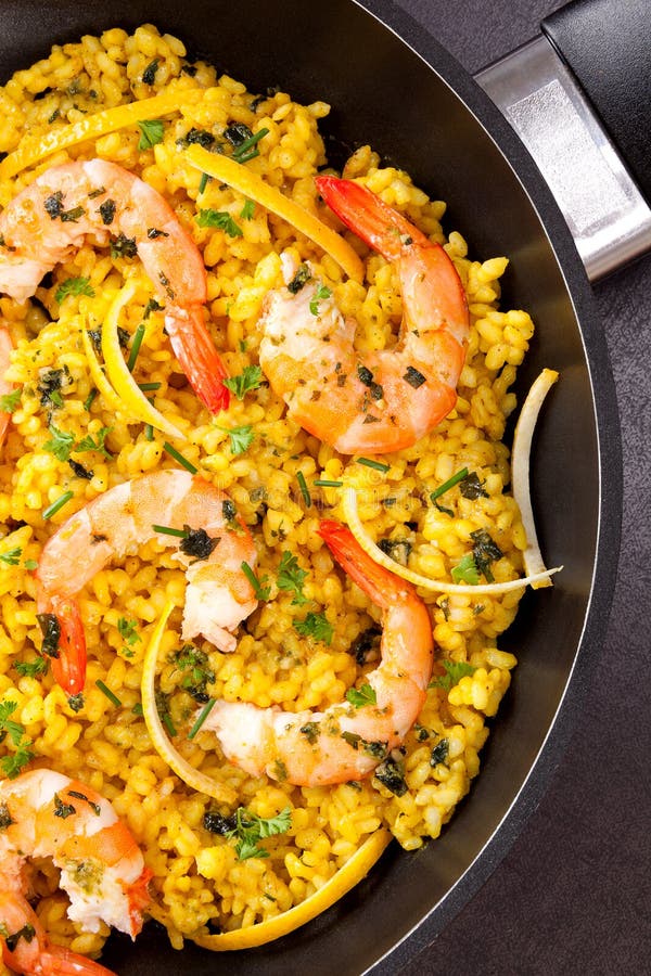 Delicious paella in pan. stock photo. Image of mollusk 93747410
