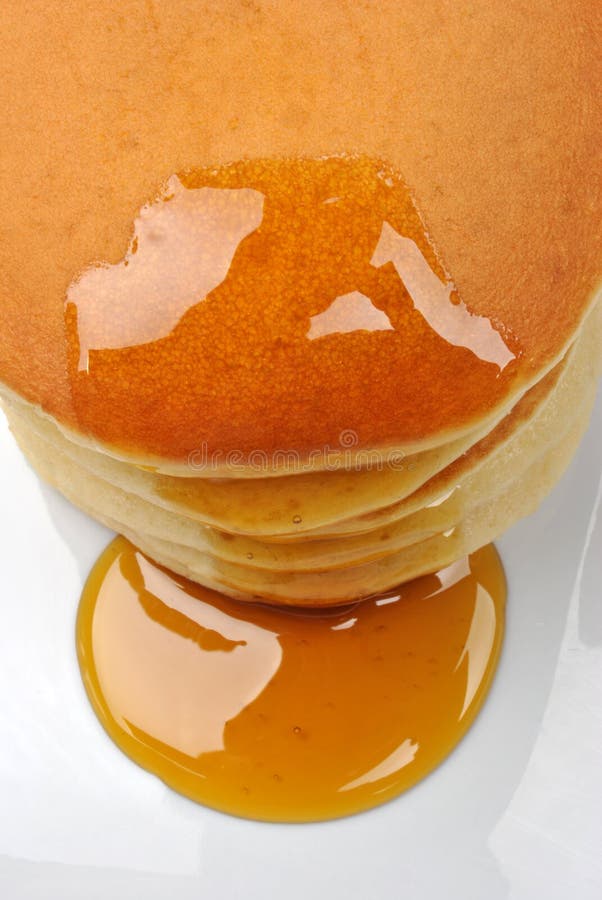 Delicious pancake with organic honey royalty free stock photo