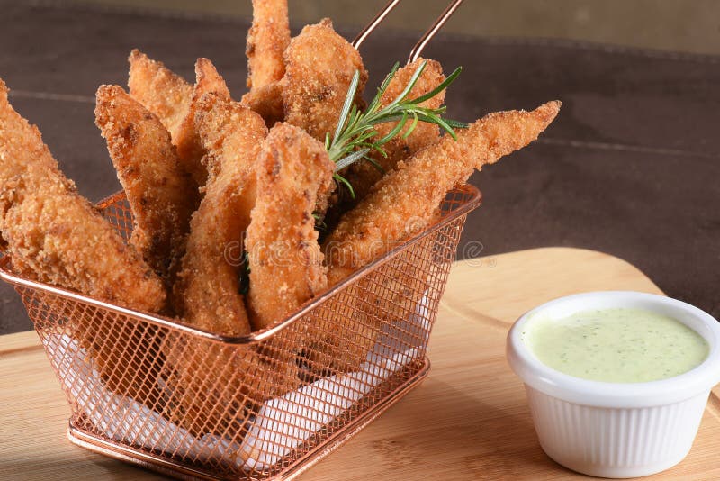 Delicious Pieces of Fried Fish and Chicken Breaded with Panko Flour