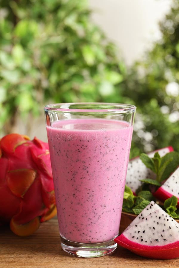 Delicious Pitahaya Smoothie and Fresh Fruits on Wooden Table Stock ...