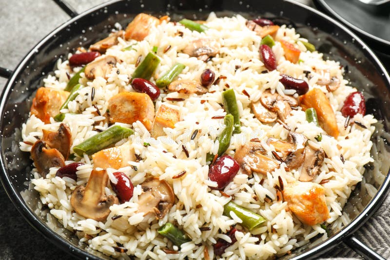 Delicious Rice Pilaf with Chicken and Vegetables in Pan Stock Image
