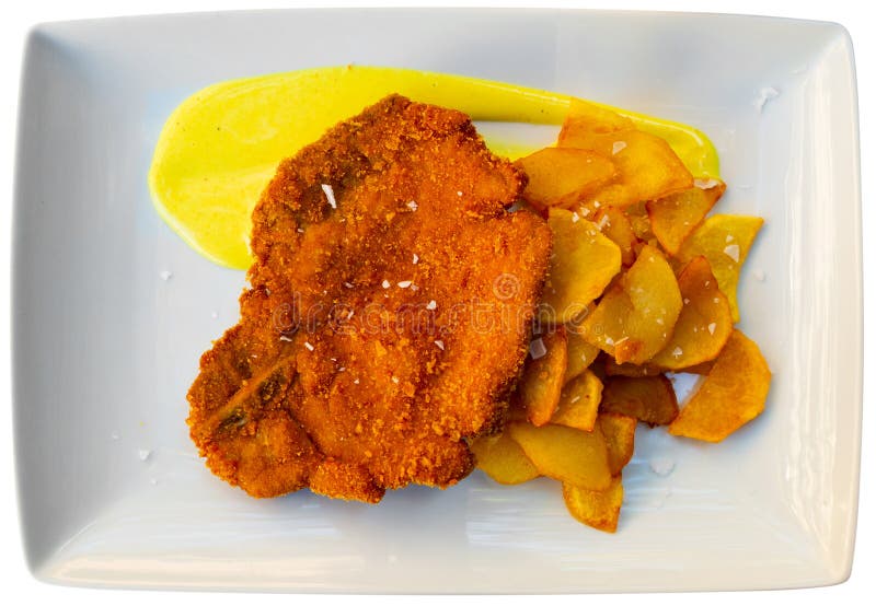 Breaded Pork Fillet with Fried Potatoes and Bearnaise Sauce Stock Photo ...
