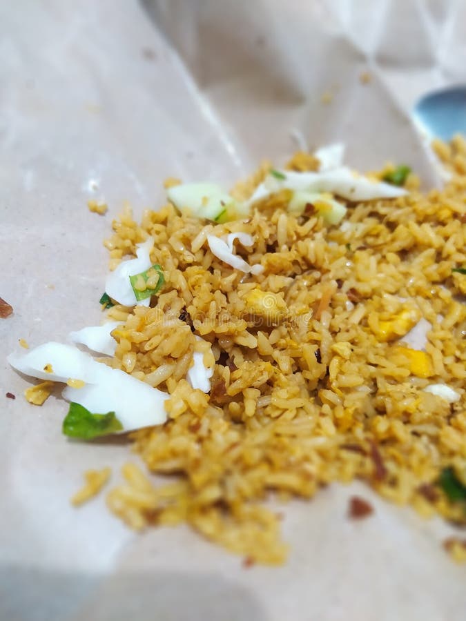 Delicious and Simple Egg Fried Rice Wrapped in Greaseproof Paper Stock
