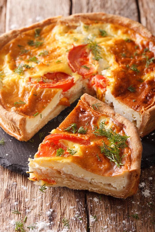 Delicious Sliced Pie with Feta Cheese, Tomatoes and Herbs Closeup ...