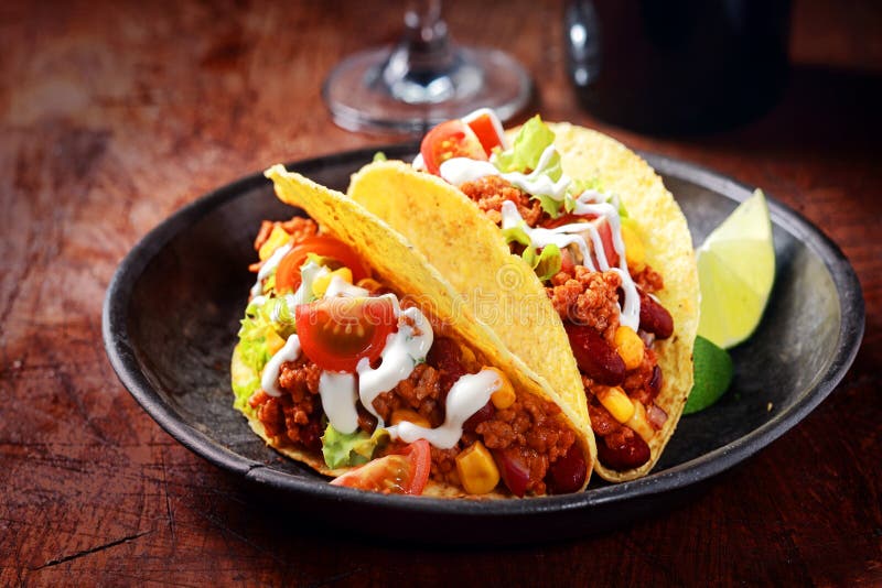 Delicious spicy tacos with meat and vegetables stock photo Delicious spicy tacos with meat and vegetables stock photo