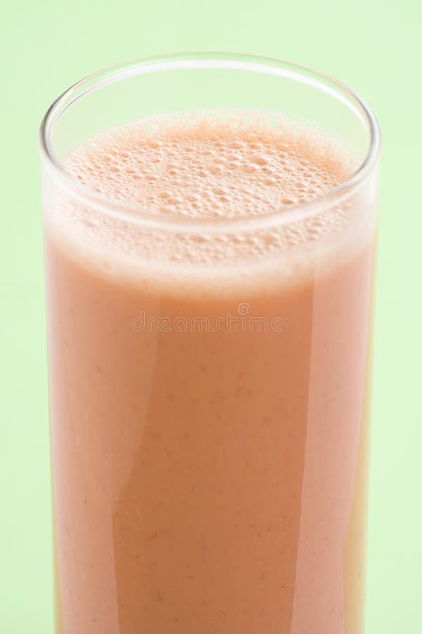 Delicious strawberry orange banana milkshake