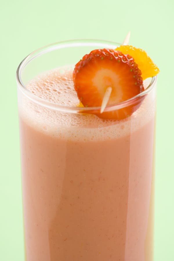 Delicious strawberry orange banana milkshake