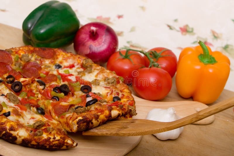 Delicious supreme pizza stock images