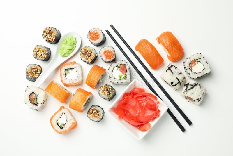 Delicious sushi rolls on white background. Japanese food