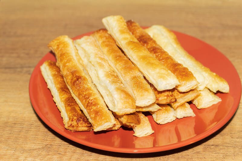 Delicious and Sweet Puff Pastry Sticks with Cinnamon Stock Image