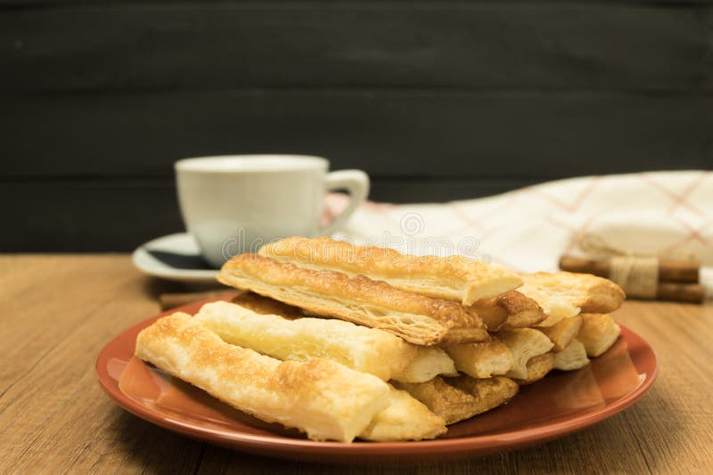 Delicious and Sweet Puff Pastry Sticks with Cinnamon Stock Photo
