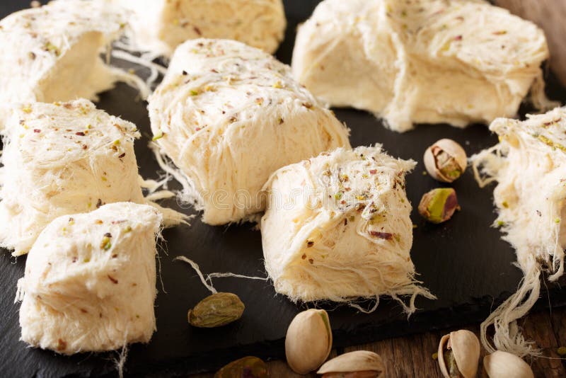 Delicious sweetness fresh dessert pismaniye with nuts pistachios stock photography Delicious sweetness fresh dessert pismaniye with nuts pistachios stock photography