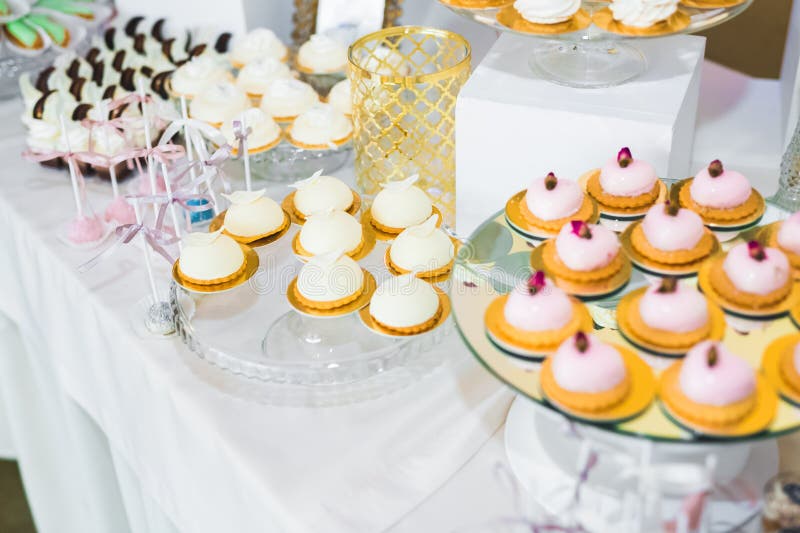 Delicious Sweets On Wedding Candy Buffet With Desserts Cupcakes Stock