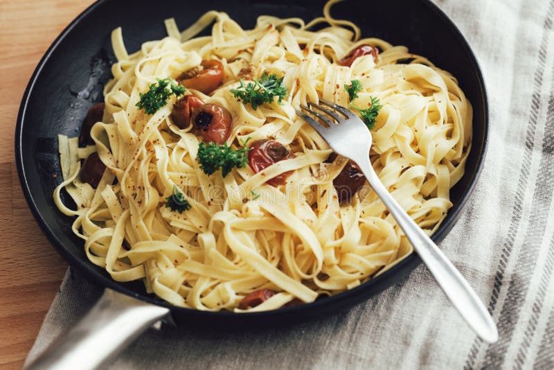 Delicious Tagliatelle Pasta in a Cast Iron Skillet Stock Image - Image ...