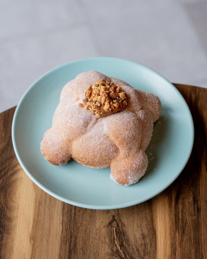 Premium Photo  Three pieces of pan de muerto. day of the dead