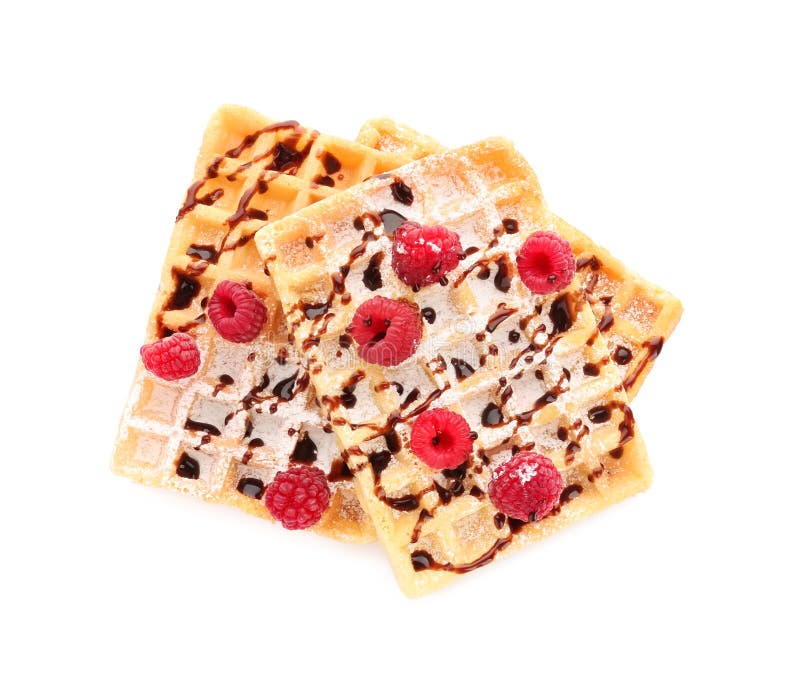 Delicious waffles with chocolate syrup and raspberries on white background stock images Delicious waffles with chocolate syrup and raspberries on white background stock images