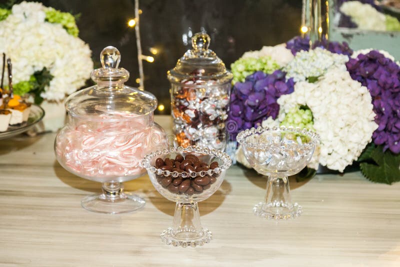 Delicious wedding reception candy bar dessert table stock photo