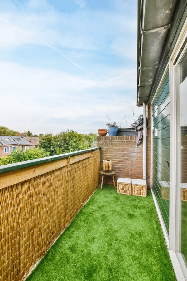 Delightful Balcony with Green Artificial Turf Stock Image Image of