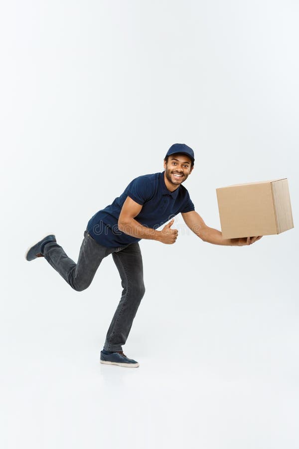 Delivery Concept - Handsome African American delivery man rush running for ...