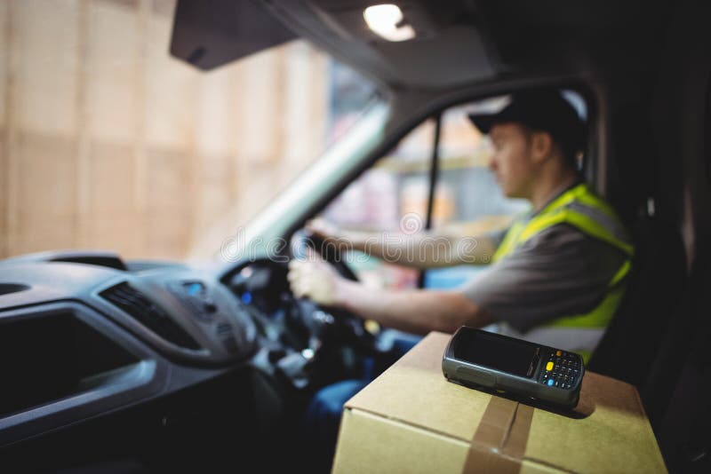Delivery Driver Driving Van with Parcels on Seat Stock Image Image of parcel, loading 66942067