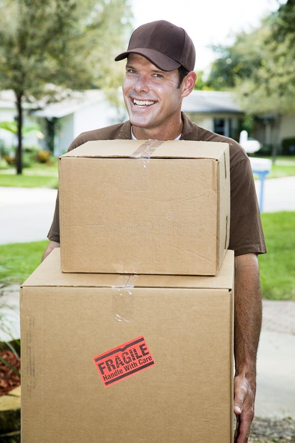 Download Delivery Man Carries Packages Stock Image - Image of caucasian, labor: 13047443