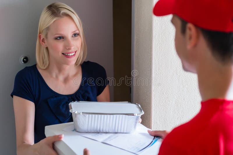 Delivery man giving fast food order to customer royalty free stock images Delivery man giving fast food order to customer royalty free stock images