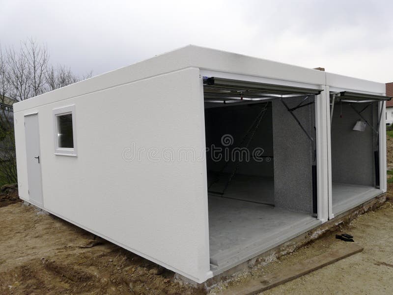 Prefabricated garage on construction side stock images