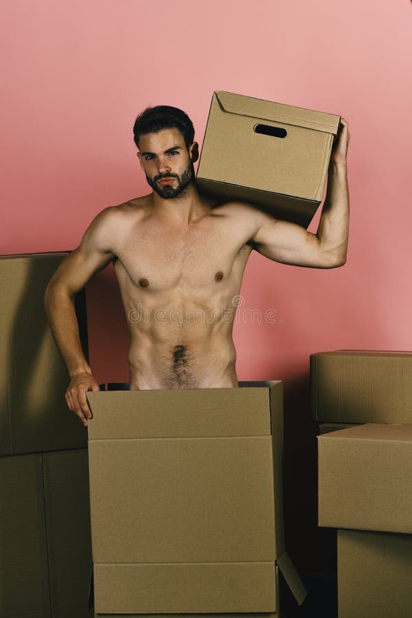 Delivery And Sexuality Concept Naked Guy Holding Carton On Shoulder