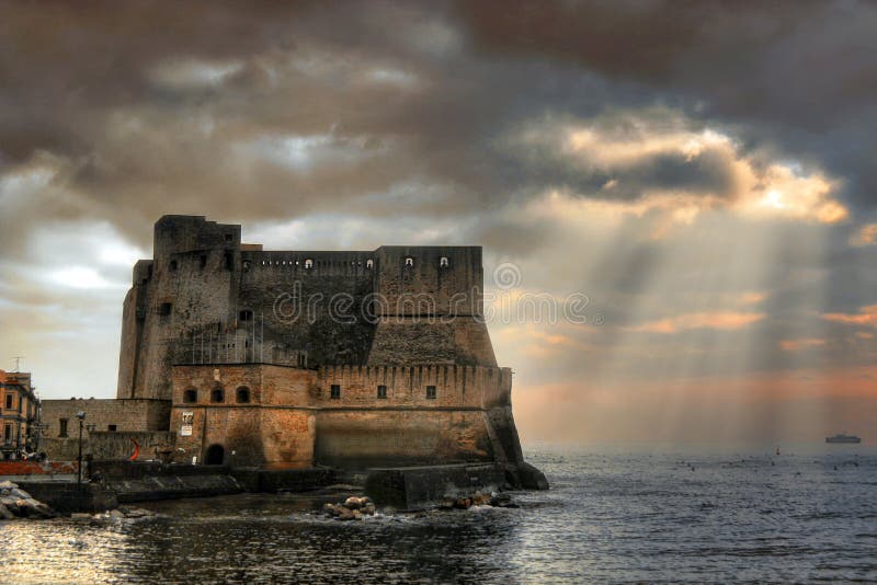 Castel dell'Ovo (from Italian: Egg Castle) is a castle in the Italian city of Naples. The edifice is located on a small island in The Tyrrhenian Sea. The first castle on the site was built by Roger II of Sicily in 1139. Castel dell'Ovo (from Italian: Egg Castle) is a castle in the Italian city of Naples. The edifice is located on a small island in The Tyrrhenian Sea. The first castle on the site was built by Roger II of Sicily in 1139