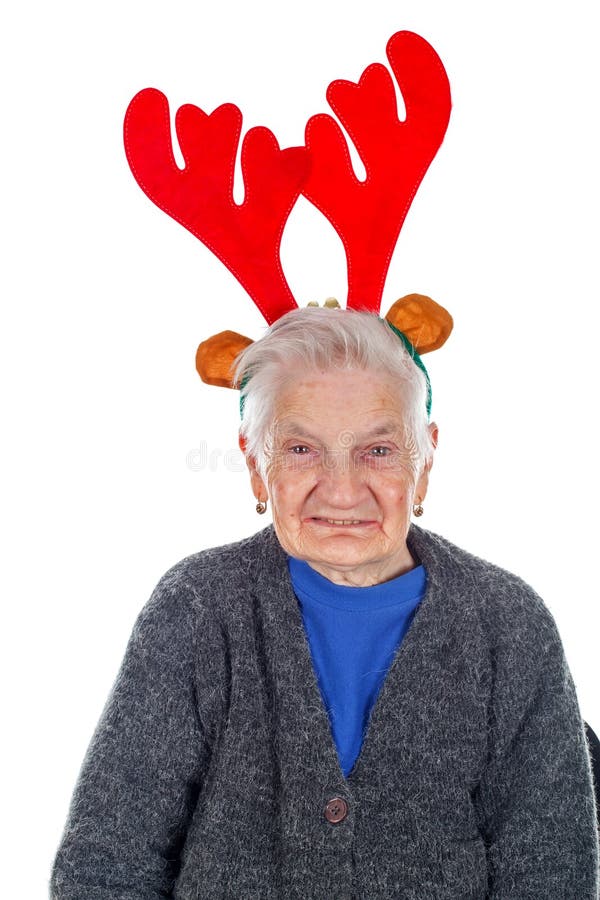 ` Della nonna con uno scorrevole della renna immagine stock libera da diritti ` Della nonna con uno scorrevole della renna immagine stock libera da diritti