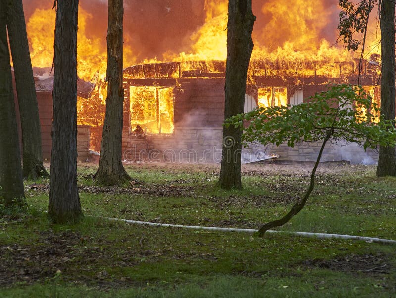 Demolition house fire for firemen. stock photo