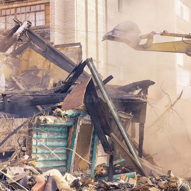 Demolition house using excavator in city. Rebuilding process. Remove equipment stock image