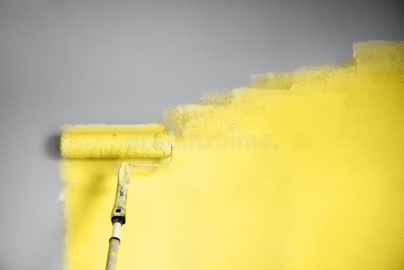 Roller with Yellow Paint on White Wall Stock Image - Image of brushing ...