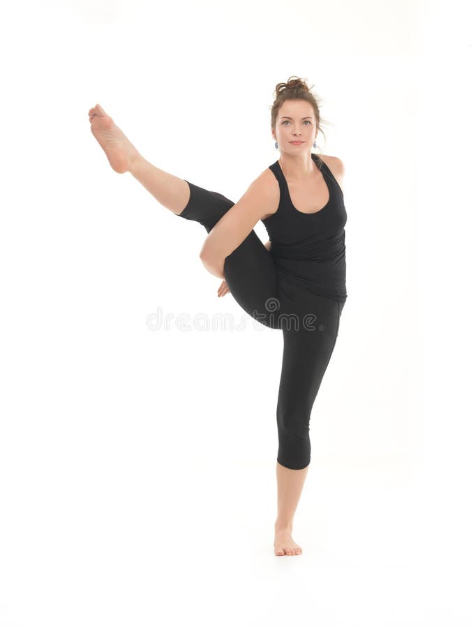 Demonstration of advanced yoga pose stock photo Demonstration of advanced yoga pose stock photo