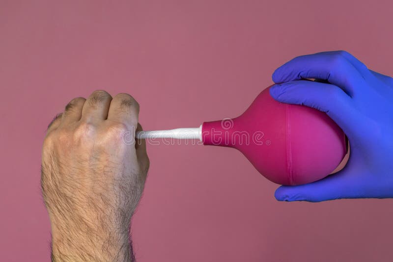 Demonstration of the Use of Enema. Stock Image Image of device
