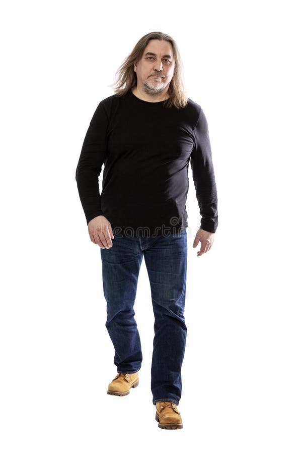 Den allvarliga beslutsamma mitt åldrades mannen med långt hår full h?jd bakgrund isolerad white royaltyfri bild Den allvarliga beslutsamma mitt åldrades mannen med långt hår full h?jd bakgrund isolerad white royaltyfri bild