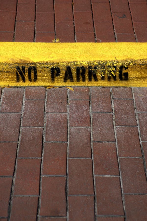 No parking sign on kerb in celebration florida united states usa vertical. No parking sign on kerb in celebration florida united states usa vertical