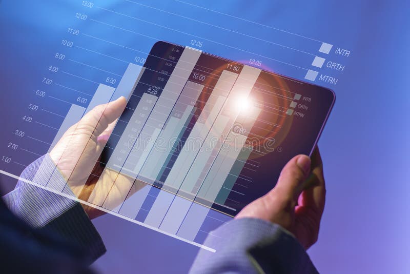 Den digitala minnestavlan, som rymms, blottor tänder omgivet av en röd cirkel som visar ett stångdiagram av näringslivsutveckling arkivbilder Den digitala minnestavlan, som rymms, blottor tänder omgivet av en röd cirkel som visar ett stångdiagram av näringslivsutveckling arkivbilder