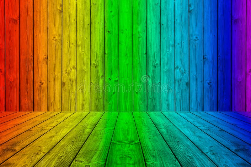 Den färgrika wood plankabakgrundsasken i regnbåge färgar