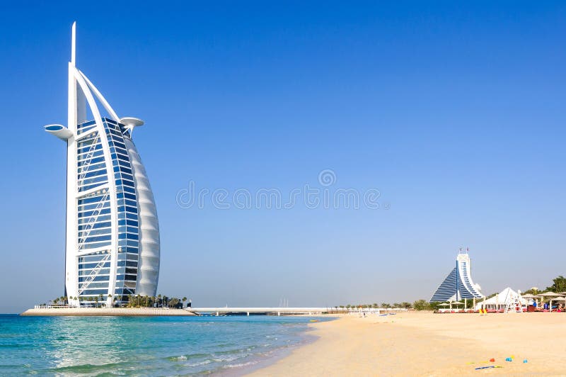 Burj Al Arab (Tower of the Arabs) is a luxury hotel located in Dubai, United Arab Emirates. It is 'The world's only 7 star Hotel' since 1999. At 321 m (1,053 ft), it is the fourth tallest hotel in the world; however, 39% of its total height is made up of non-occupiable space. Burj Al Arab stands on an artificial island 280 m (920 ft) from Jumeirah beach. Burj Al Arab (Tower of the Arabs) is a luxury hotel located in Dubai, United Arab Emirates. It is 'The world's only 7 star Hotel' since 1999. At 321 m (1,053 ft), it is the fourth tallest hotel in the world; however, 39% of its total height is made up of non-occupiable space. Burj Al Arab stands on an artificial island 280 m (920 ft) from Jumeirah beach.