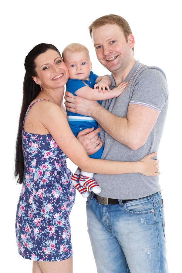Den lyckliga familjen med behandla som ett barn. arkivbild Den lyckliga familjen med behandla som ett barn. arkivbild