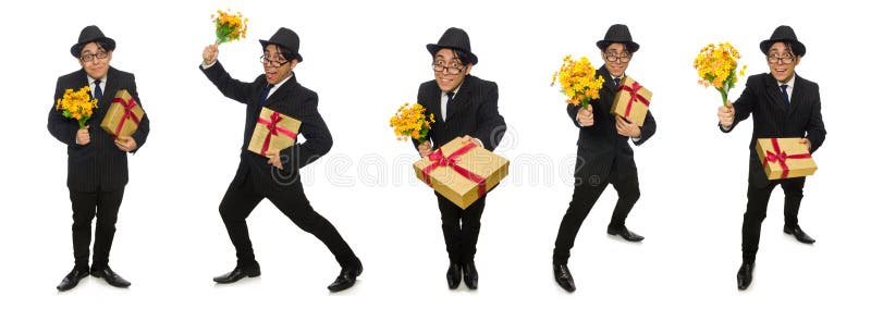 Den roliga mannen med blommor och giftbox royaltyfria bilder Den roliga mannen med blommor och giftbox royaltyfria bilder
