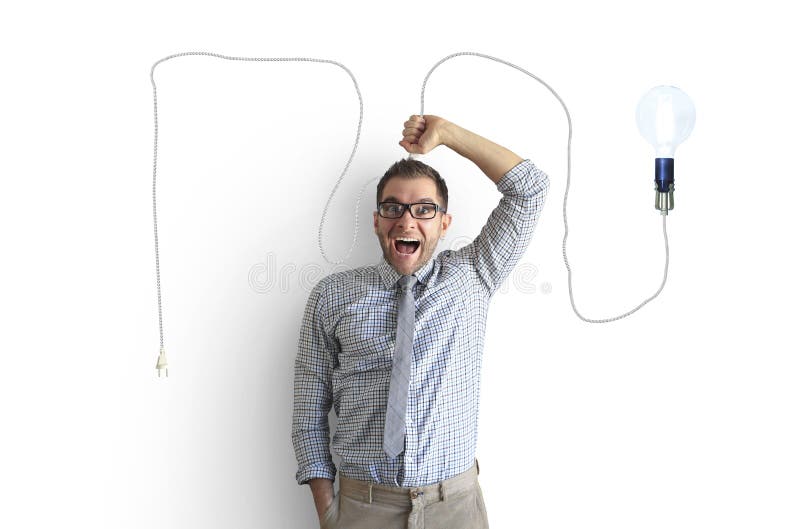 Den unga mannen ler och rymmer en ljus ljus kula arkivfoto Den unga mannen ler och rymmer en ljus ljus kula arkivfoto