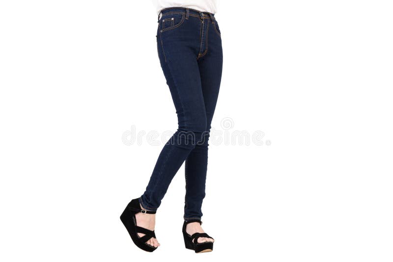 Fotografia do Stock: Slim girl sitting on the street in blue jeans