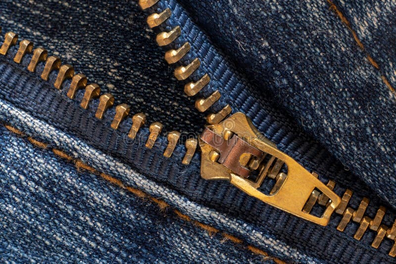 Denim or rough cotton fabric or jeans material with the zipper royalty free stock photo Denim or rough cotton fabric or jeans material with the zipper royalty free stock photo
