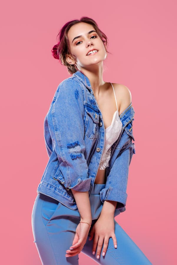 Beautiful Stylish Young Woman Trendy Denim Jacket Poses Outdoor Stock Photo  by ©alonesdj 212005050