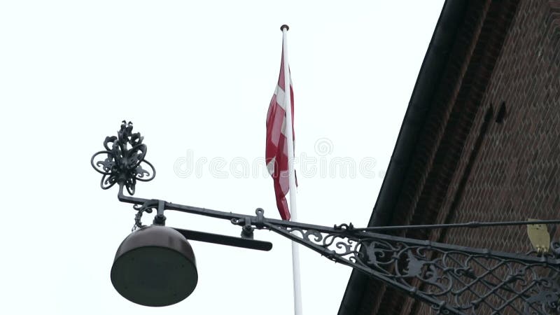 Denmark red flag with shop craftwork metal signage