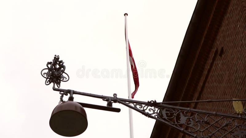 Denmark red flag with shop craftwork metal signage